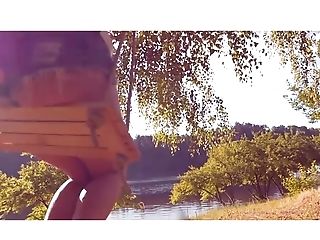 Youthful Beautiful Honey Li Moon Is Sunbathing On The Lake
