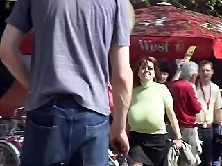 Look At These Phat Tits Ambling Down The Streets.